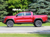 2023-gmc-canyon-at4x-volcanic-red-tintcoat-gnt-first-real-world-photos-october-2022-exterior-007