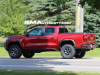 2023-gmc-canyon-at4x-volcanic-red-tintcoat-gnt-first-real-world-photos-october-2022-exterior-010