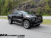 2023-gmc-canyon-denali-onyx-black-gba-first-drive-exterior-005-side-front-three-quarters