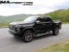 2023-gmc-canyon-denali-onyx-black-gba-first-drive-exterior-024-side-front-three-quarters