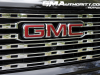 2023-gmc-canyon-denali-onyx-black-gba-first-drive-exterior-027-gmc-logo-badge-on-grille
