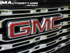 2023-gmc-canyon-denali-onyx-black-gba-first-drive-exterior-028-gmc-logo-badge-on-grille