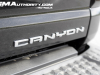 2023-gmc-canyon-denali-onyx-black-gba-first-drive-exterior-070-canyon-logo-badge-on-tailgate