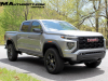 2023-gmc-canyon-elevation-sterling-metallic-gxd-first-drive-exterior-006-front-three-quarters