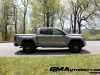 2023-gmc-canyon-elevation-sterling-metallic-gxd-first-drive-exterior-007-side