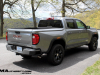 2023-gmc-canyon-elevation-sterling-metallic-gxd-first-drive-exterior-009-side-rear-three-quarters