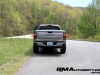 2023-gmc-canyon-elevation-sterling-metallic-gxd-first-drive-exterior-012-rear