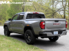 2023-gmc-canyon-elevation-sterling-metallic-gxd-first-drive-exterior-015-rear-three-quarters