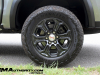 2023-gmc-canyon-elevation-sterling-metallic-gxd-first-drive-exterior-018-goodyear-wrangler-territory-at-all-terrain-tire-18-inch-gloss-black-wheel