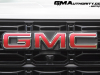 2023-gmc-canyon-elevation-sterling-metallic-gxd-first-drive-exterior-030-gmc-logo-badge-on-grille