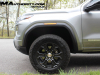 2023-gmc-canyon-elevation-sterling-metallic-gxd-first-drive-exterior-054-goodyear-wrangler-territory-at-all-terrain-tire-18-inch-gloss-black-wheel