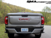 2023-gmc-canyon-elevation-sterling-metallic-gxd-first-drive-exterior-074-gmc-logo-badge-on-tailgate