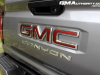 2023-gmc-canyon-elevation-sterling-metallic-gxd-first-drive-exterior-076-gmc-canyon-logo-badge-on-tailgate
