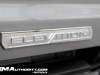 2023-gmc-canyon-elevation-sterling-metallic-gxd-first-drive-exterior-078-elevation-logo-badge-on-tailgate