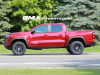 2023-gmc-canyon-elevation-volcanic-red-tintcoat-gnt-first-photos-august-2022-exterior-007