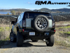 2024-gmc-hummer-ev-suv-3x-edition-1-moonshot-green-matte-g7w-first-drive-exterior-032-rear-spare-tire-rear-wheel-steer-extract-mode