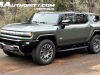 2024-gmc-hummer-ev-suv-3x-edition-1-moonshot-green-matte-g7w-first-drive-exterior-114-side-front-three-quarters