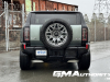 2024-gmc-hummer-ev-suv-3x-edition-1-moonshot-green-matte-g7w-first-drive-exterior-143-rear