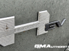2024-gmc-hummer-ev-suv-3x-edition-1-moonshot-green-matte-g7w-first-drive-exterior-154-hummer-ev-logo-badge-on-door