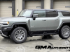 2024-gmc-hummer-ev-suv-3x-edition-1-moonshot-green-matte-g7w-first-drive-exterior-170-side-front-three-quarters