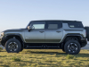 2024-gmc-hummer-ev-suv-extreme-off-road-package-z6x-moonshot-green-matte-g7w-press-photos-exterior-008-side