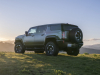 2024-gmc-hummer-ev-suv-extreme-off-road-package-z6x-moonshot-green-matte-g7w-press-photos-exterior-010-side-rear-three-quarters