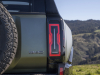 2024-gmc-hummer-ev-suv-extreme-off-road-package-z6x-moonshot-green-matte-g7w-press-photos-exterior-015-gmc-logo-badge-tail-light-part-of-spare-tire