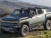 2024-gmc-hummer-ev-suv-extreme-off-road-package-z6x-moonshot-green-matte-g7w-press-photos-exterior-025-side-front-three-quarters-infinity-roof-panels-removed