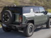 2024-gmc-hummer-ev-suv-extreme-off-road-package-z6x-moonshot-green-matte-g7w-press-photos-exterior-030-side-rear-three-quarters