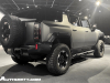 2024-gmc-hummer-ev-suv-extreme-offroad-package-media-briefing-moonshot-green-matte-g7w-exterior-004-side-rear-three-quarters