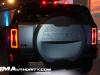 2024-gmc-hummer-ev-suv-omega-edition-neptune-blue-matte-media-reveal-exterior-038-rear-tail-lights-spare-tire-cover-with-hummer-ev-logo-debossed-and-moon-topography