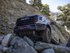 2023-sierra-1500-at4x-aev-edition-press-photos-exterior-004-front-aev-front-bumper-with-winch-grille-front-approach-skid-plate-wheels-33-inch-tires