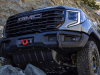 2023-sierra-1500-at4x-aev-edition-press-photos-exterior-006-front-aev-front-bumper-with-winch-grille-front-approach-skid-plate-wheels-33-inch-tires