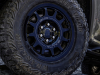 2023-sierra-1500-at4x-aev-edition-press-photos-exterior-008-18-inch-aev-salta-wheels-in-gloss-black-finish-33-inch-goodyear-wrangler-territory-mt-tires