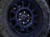 2023-sierra-1500-at4x-aev-edition-press-photos-exterior-009-18-inch-aev-salta-wheels-in-gloss-black-finish-33-inch-goodyear-wrangler-territory-mt-tires