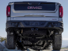 2023-sierra-1500-at4x-aev-edition-press-photos-exterior-011-rear-aev-rear-bumper-skid-plates-black-contrast-inner-multipro-tailgate-spare-tire-and-wheel