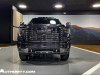 2024-gmc-sierra-2500-hd-denali-ultimate-titanium-rush-metallic-g6m-reveal-photos-exterior-001-front-hood-scoop-intake-headlights-vader-chrome-gmc-logo-badge-and-front-grille-tow-recovery-hooks