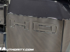 2024-gmc-sierra-2500-hd-denali-ultimate-titanium-rush-metallic-g6m-reveal-photos-exterior-014-hd-badging-on-grille