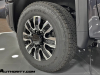 2024-gmc-sierra-2500-hd-denali-ultimate-titanium-rush-metallic-g6m-reveal-photos-exterior-020-goodyear-wrangler-trailrunner-at-tire-20-inch-wheel