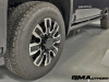 2024-gmc-sierra-2500-hd-denali-ultimate-titanium-rush-metallic-g6m-reveal-photos-exterior-021-goodyear-wrangler-trailrunner-at-tire-20-inch-wheel