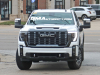 2024-gmc-sierra-2500-hd-denali-ultimate-white-frost-tricoat-g1w-on-the-road-photos-exterior-001