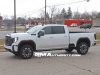2024-gmc-sierra-2500-hd-denali-ultimate-white-frost-tricoat-g1w-on-the-road-photos-exterior-005