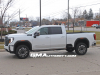 2024-gmc-sierra-2500-hd-denali-ultimate-white-frost-tricoat-g1w-on-the-road-photos-exterior-006