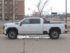 2024-gmc-sierra-2500-hd-denali-ultimate-white-frost-tricoat-g1w-on-the-road-photos-exterior-007