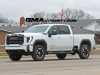 2024-gmc-sierra-hd-at4-summit-white-gaz-20-inch-10-spoke-machined-aluminum-wheels-with-grazen-metallic-painted-accents-q86-on-the-road-photos-exterior-002