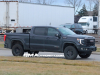 2023-5-gmc-sierra-1500-at4x-onyx-black-gba-aev-stamped-steel-high-approach-front-bumper-with-heavy-duty-cast-recovery-points-vhu-on-road-photos-exterior-002