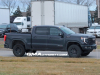 2023-5-gmc-sierra-1500-at4x-onyx-black-gba-aev-stamped-steel-high-approach-front-bumper-with-heavy-duty-cast-recovery-points-vhu-on-road-photos-exterior-003