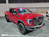 2023-gmc-sierra-at4x-1500-volcanic-red-tintcoat-gnt-2022-naias-detroit-live-photos-exterior-003-front-three-quarters