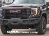 2023-gmc-sierra-at4x-1500-with-aev-front-bumper-onyx-black-gba-gmc-18-inch-gloss-black-painted-aluminum-wheels-real-world-photos-september-2022-exterior-002
