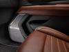 2023-gmc-yukon-denali-ultimate-press-photos-interior-014-alpine-umber-front-passenger-door-trim-bose-performance-series-speaker-grille